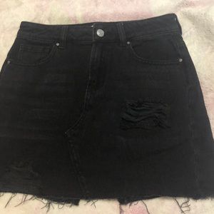black ripped denim skirt